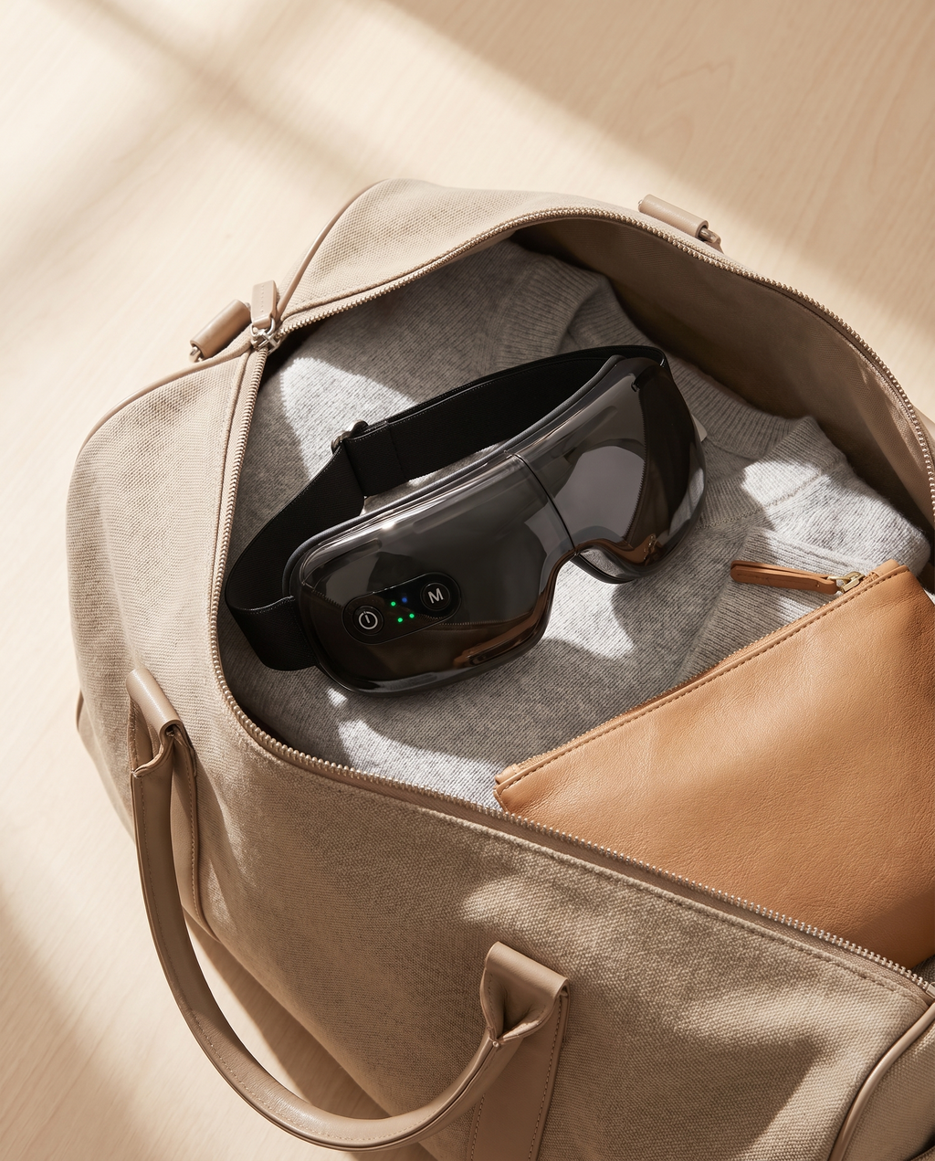 Nutelix Smart Eye Massager with protective carry pouch